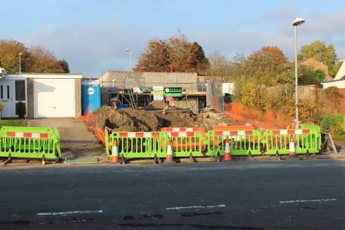 Electricity supplier digging up the pavement