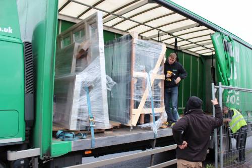 The windows arriving all packaged up on the lorry