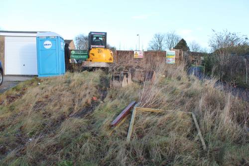 Making a gap in the temporary fence to get started