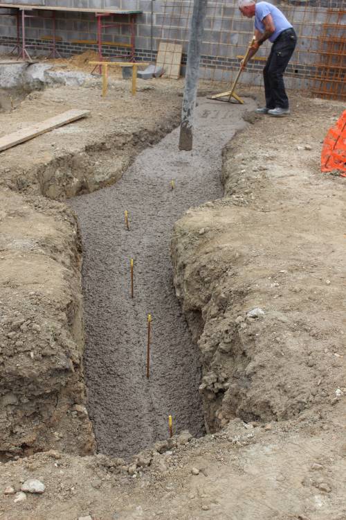 It slowly flows along like grey lava