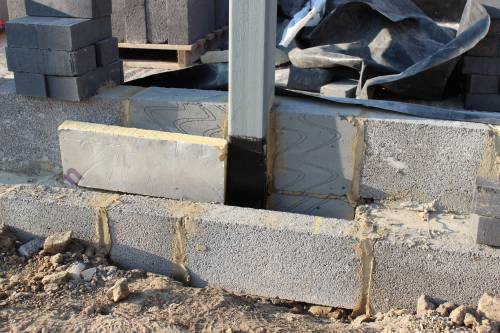 Two of the steels will be hidden within the block walls
